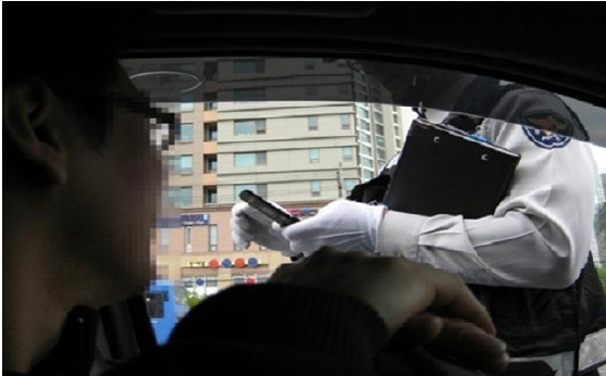 KNPA 1-1 Korean National Police officer doing driver inspection
