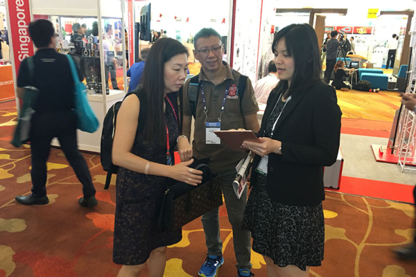 Juan attending to visitors at CommunicAsia 2017