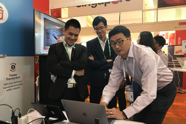 MIckey, showcasing Smart e-Form at CommunicAsia 2017