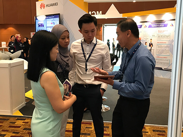 Showcasing OZ e-Form demo at Malaysia FinTech Expo 2018 