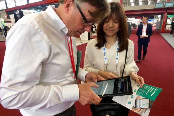 Visitors trying out Smart e-Form at Money 20/20 Europe 